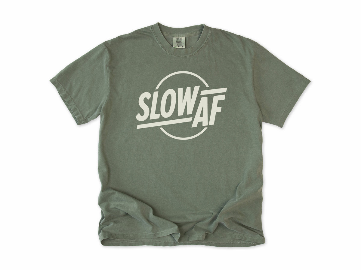 Funny cycling T-shirt in Moss, 'Slow AF' in bold letters inside a circle, for relaxed riders