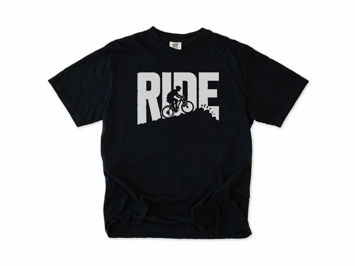 Cycling T-shirt in Black, bold 'RIDE' letters with a mountain biker on a slope, for mountain bikers