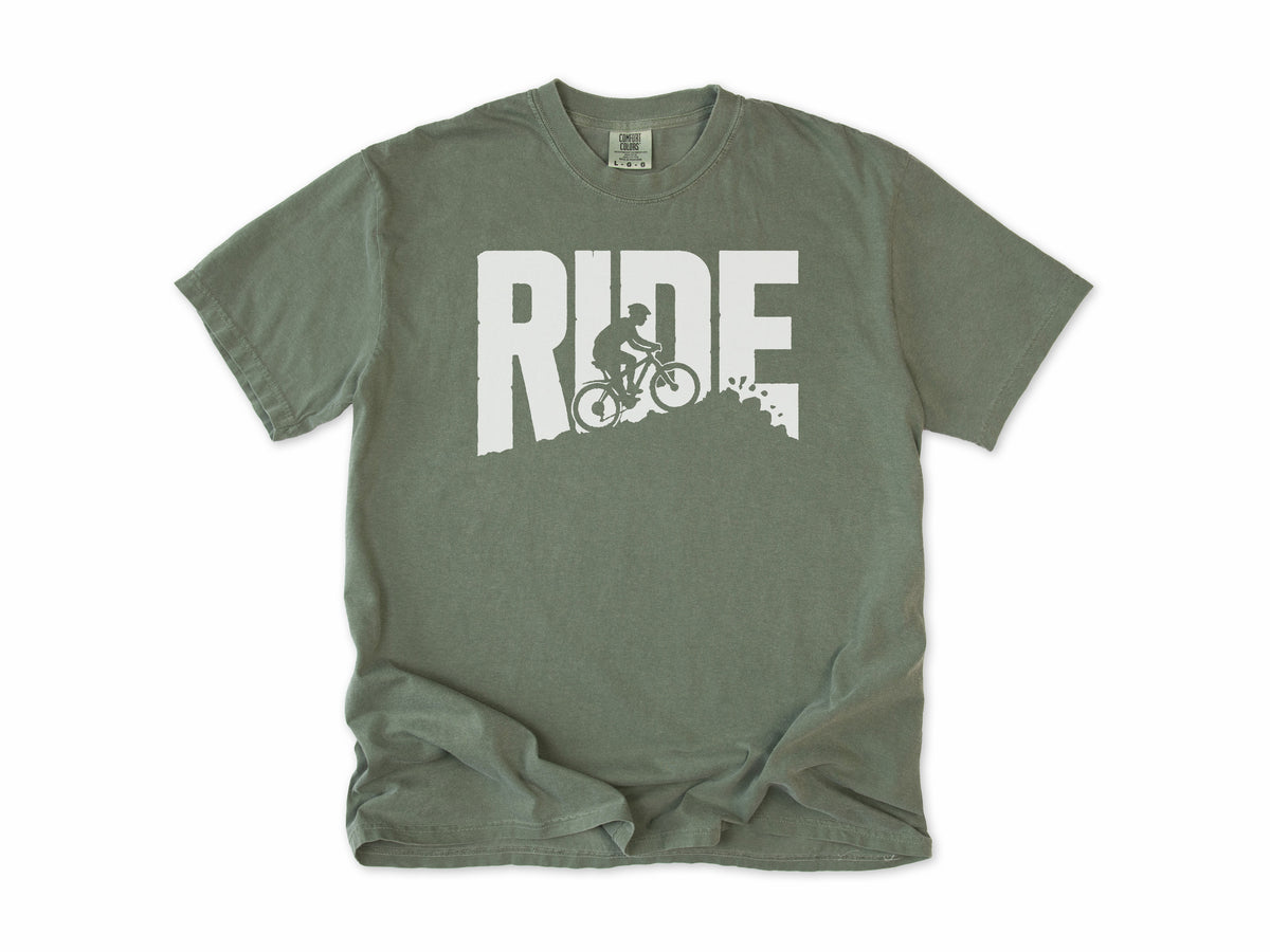 Cycling T-shirt in Moss, bold 'RIDE' letters with a mountain biker on a slope, for mountain bikers
