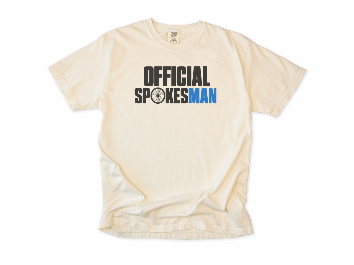 Funny cycling T-shirt in Ivory, 'Official Spokesman' with a wheel and blue lettering, gift for a cyclist
