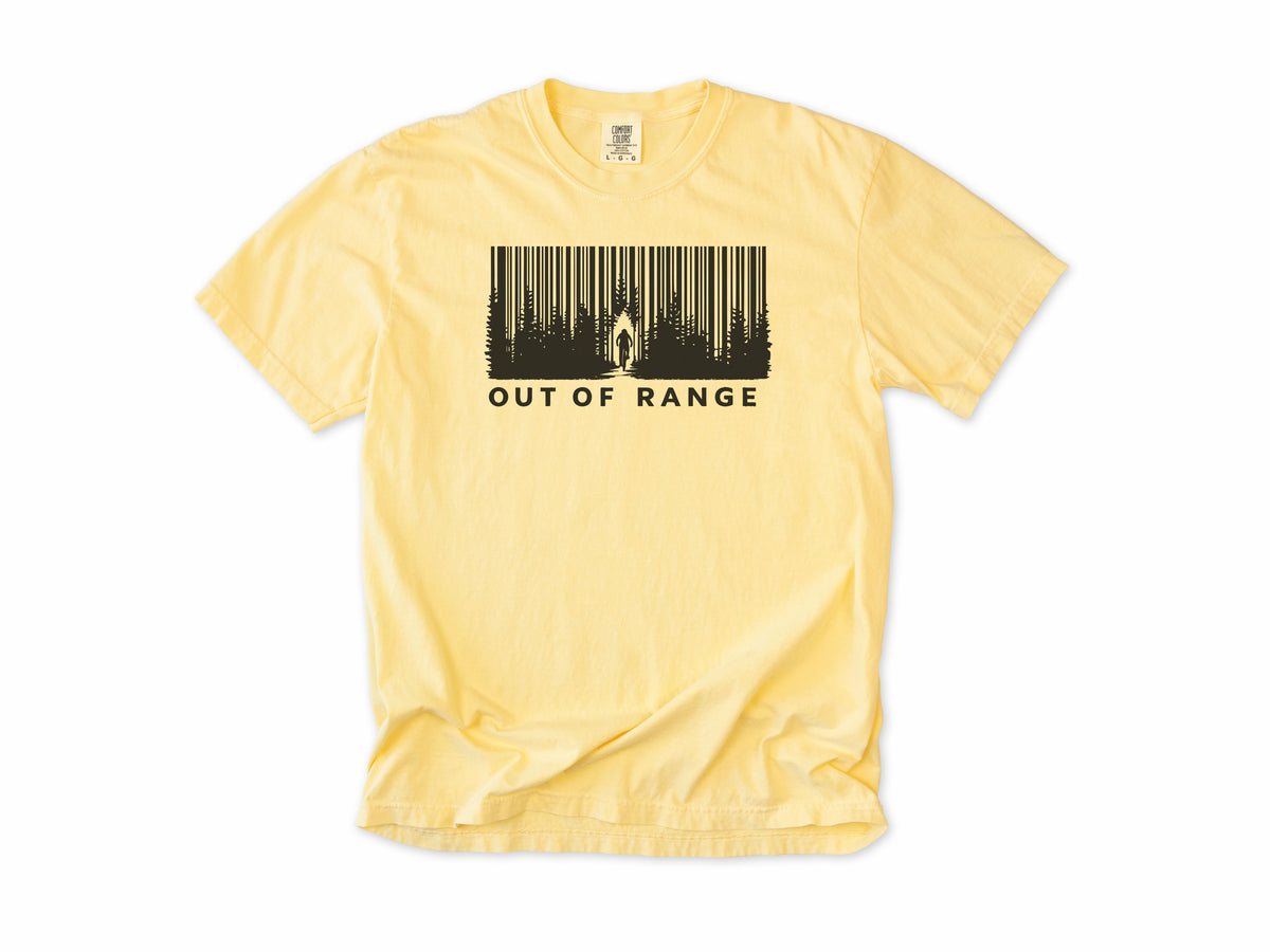 Funny cycling T-shirt in Butter, 'Out of Range' with a forest of trees drawn as a barcode, for riders who ride off the grid