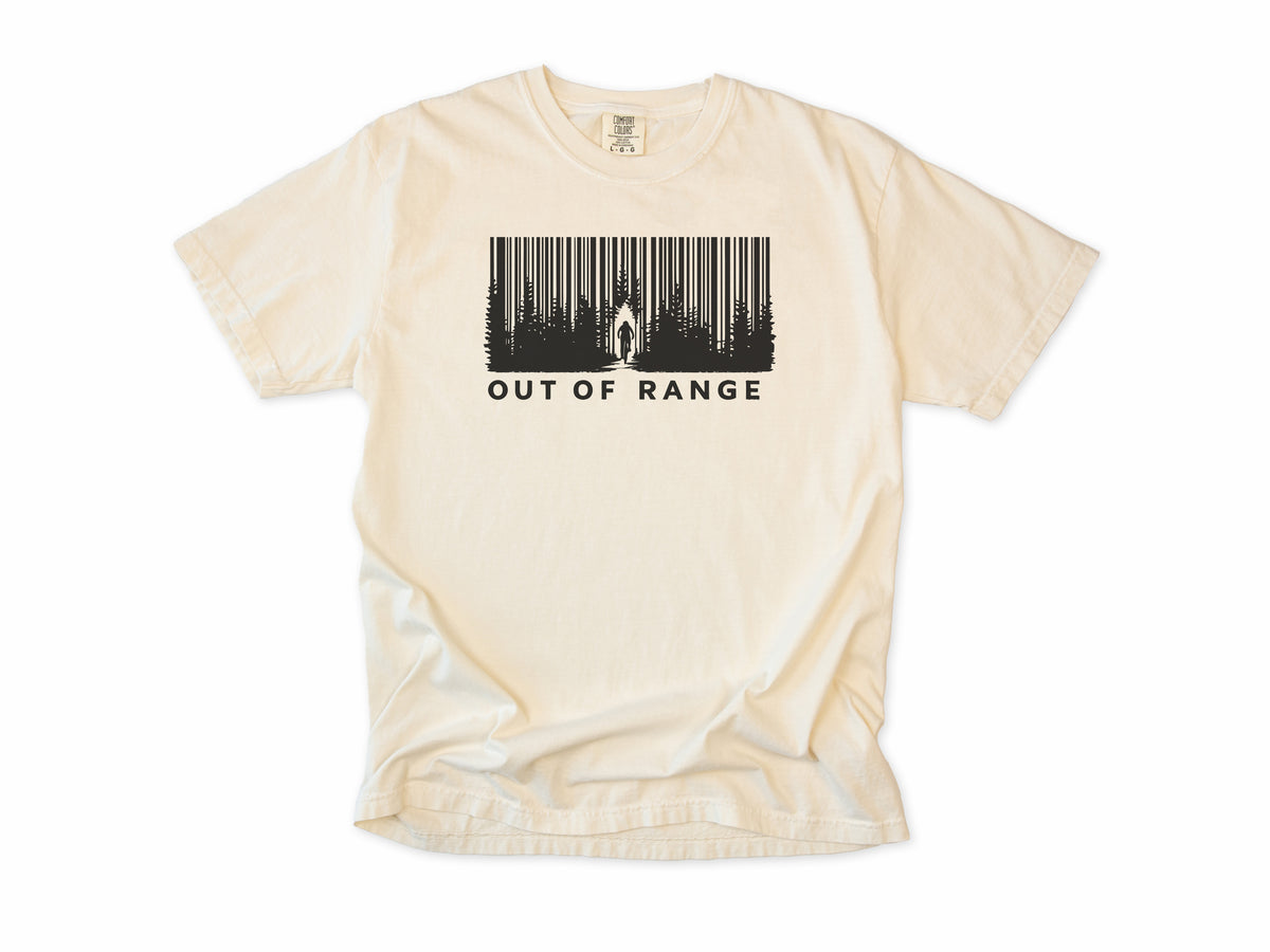 Funny cycling T-shirt in Ivory, 'Out of Range' with a forest of trees drawn as a barcode, for riders who ride off the grid