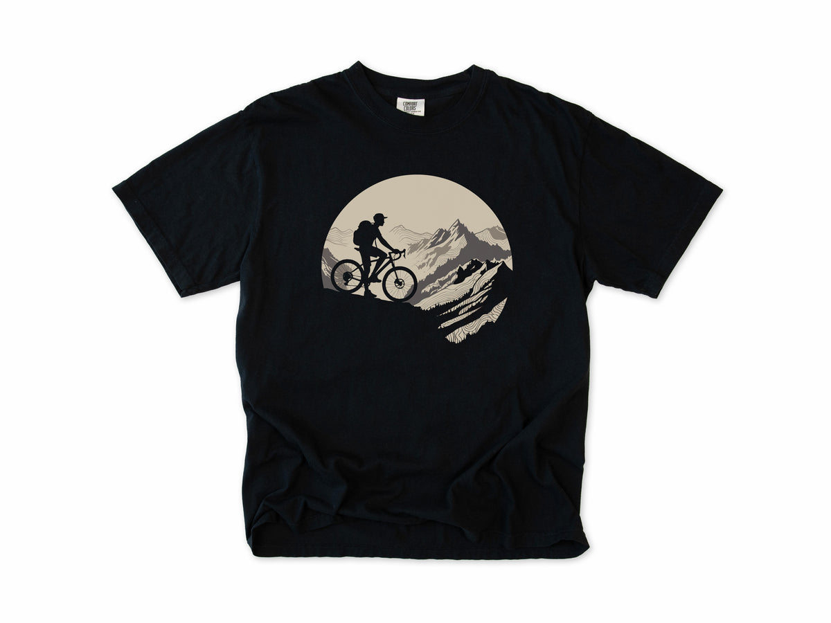 Cycling T-shirt in Black, a mountain biker climbing a rocky peak, in a circle, for mountain bikers