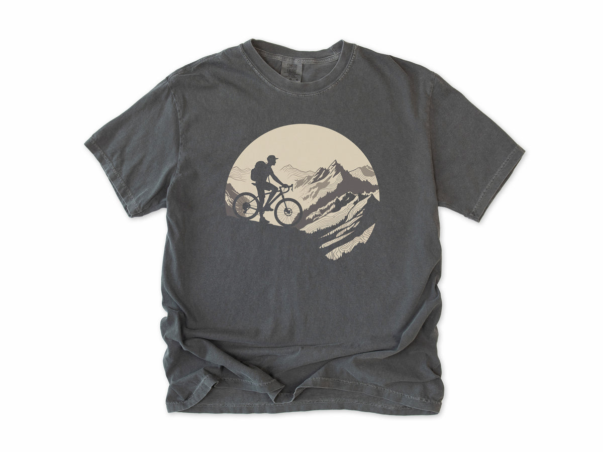Cycling T-shirt in Pepper, a mountain biker climbing a rocky peak, in a circle, for mountain bikers