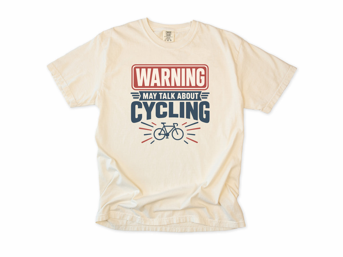 Funny cycling T-shirt in Ivory, a 'Warning: May talk about cycling' sign with a bike, for cyclists who talk bikes