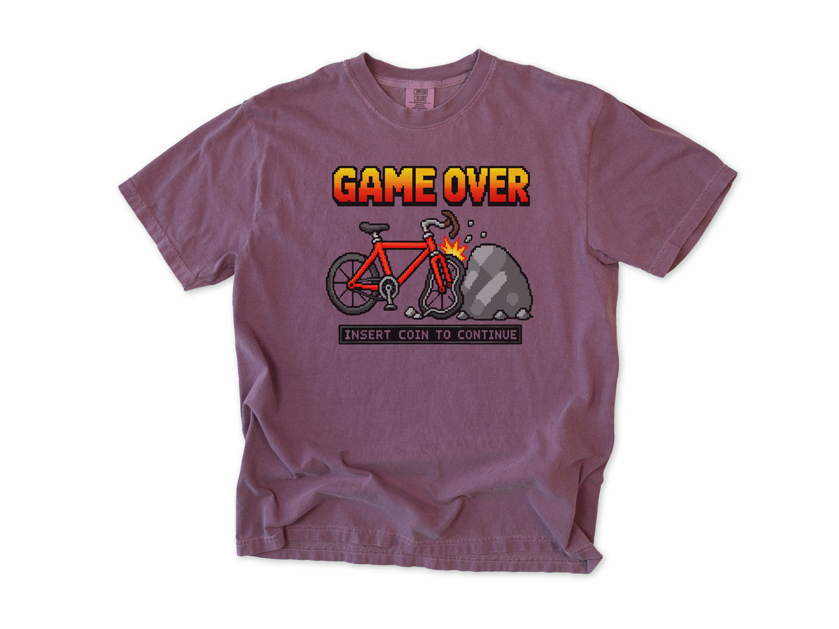 Funny cycling T-shirt in Berry, 'Game Over, Insert Coin to Continue', a crashed bike, for cyclists who game