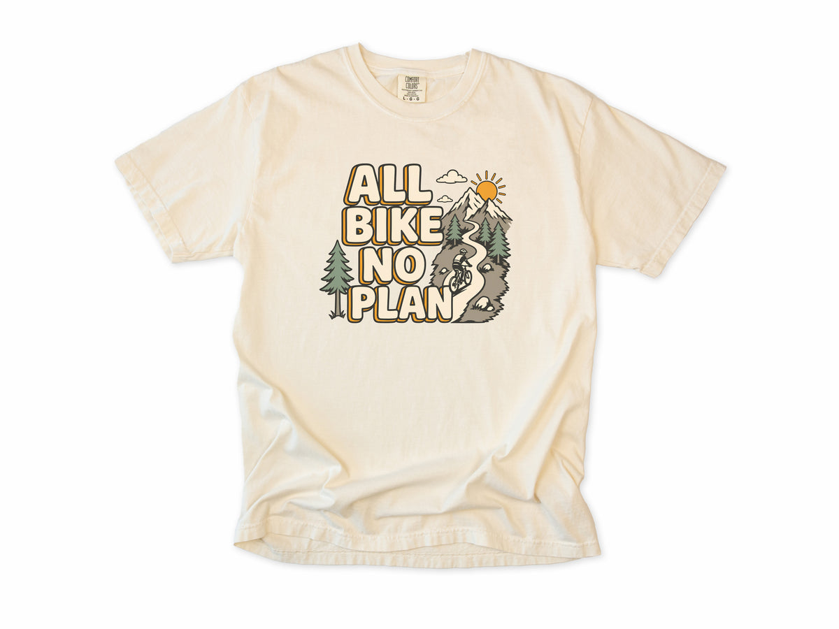 Cycling T-shirt in Ivory, 'All Bike No Plan' with a mountain trail, for gravel and mountain bikers