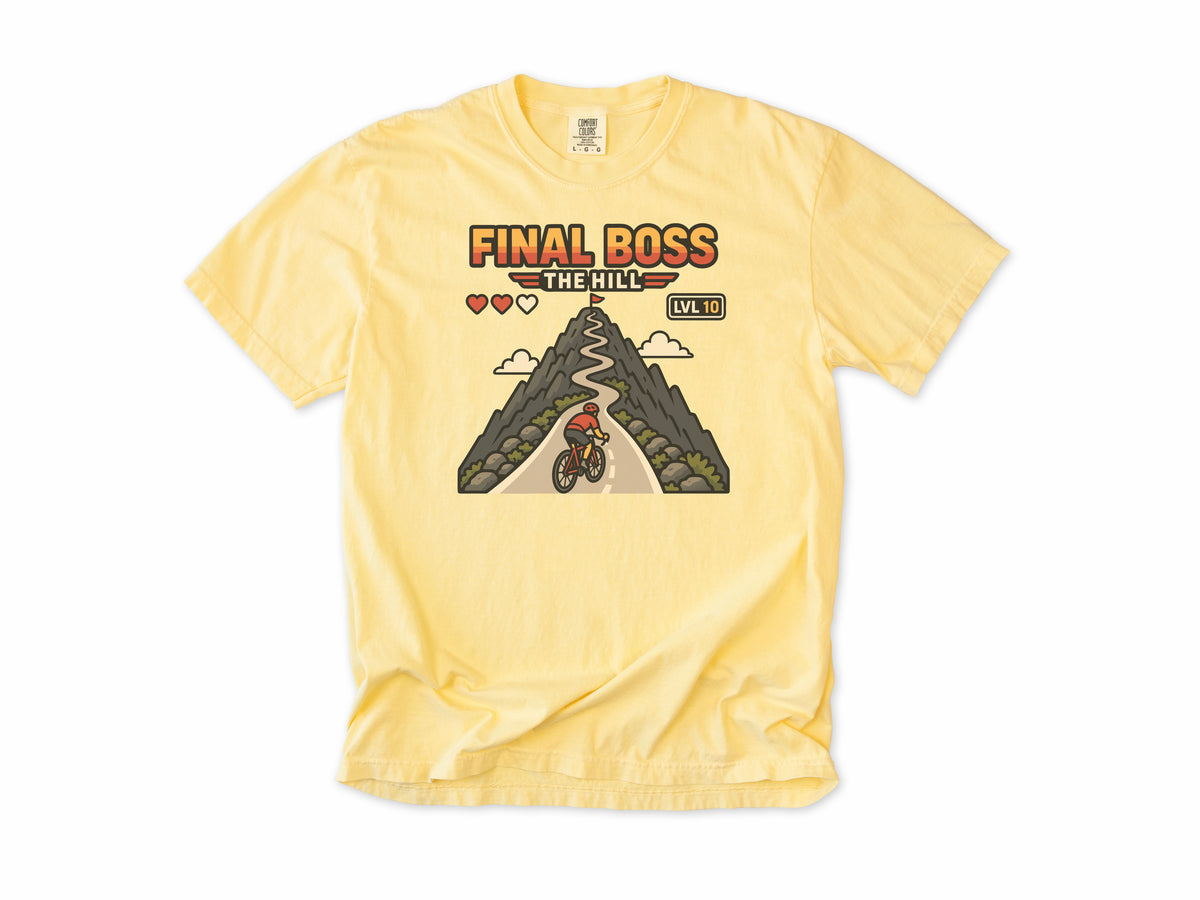 Funny cycling T-shirt in Butter, 'Final Boss: The Hill', a retro video game hill with a cyclist, for hill climbers who game
