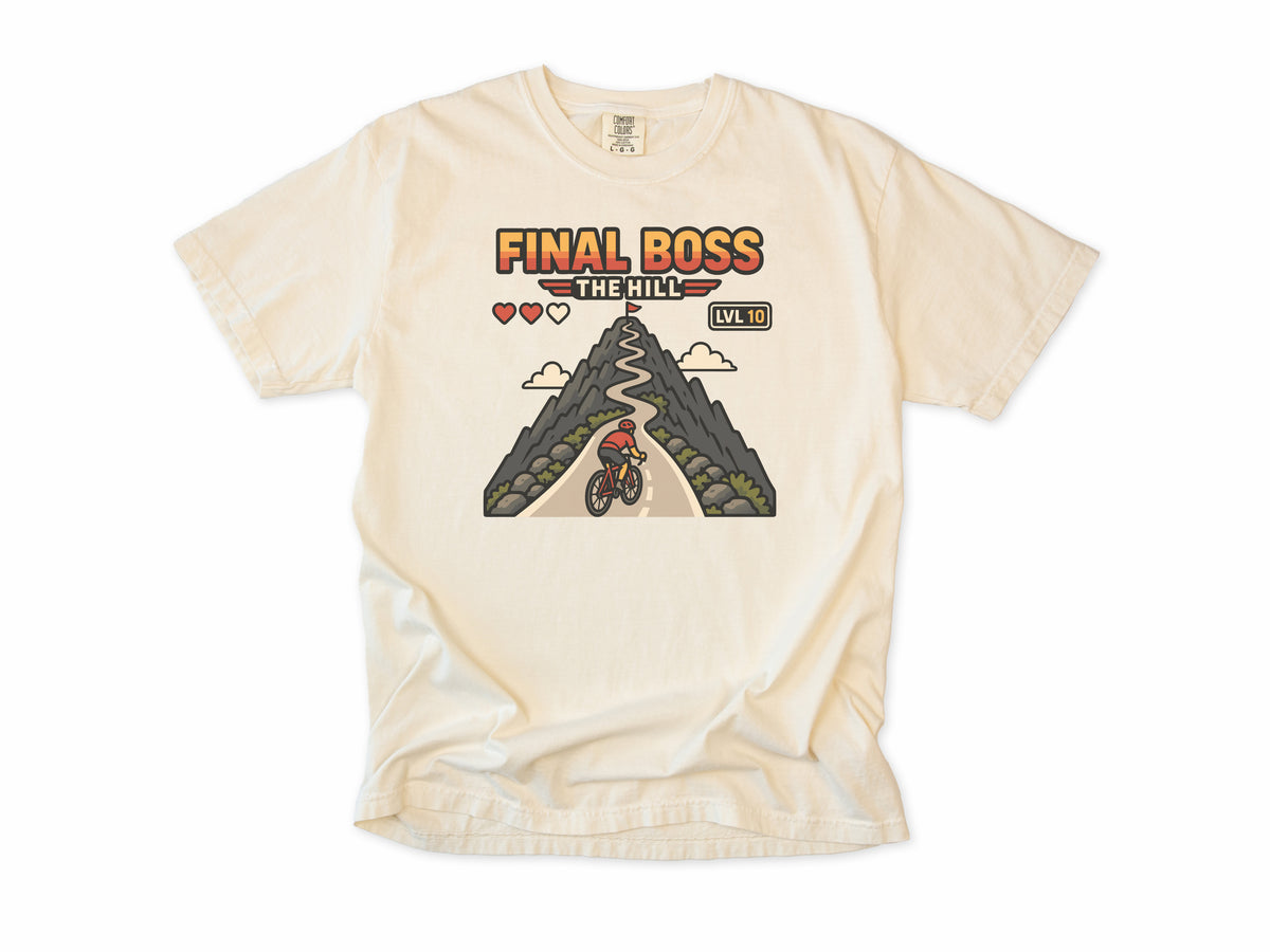 Funny cycling T-shirt in Ivory, 'Final Boss: The Hill', a retro video game hill with a cyclist, for hill climbers who game