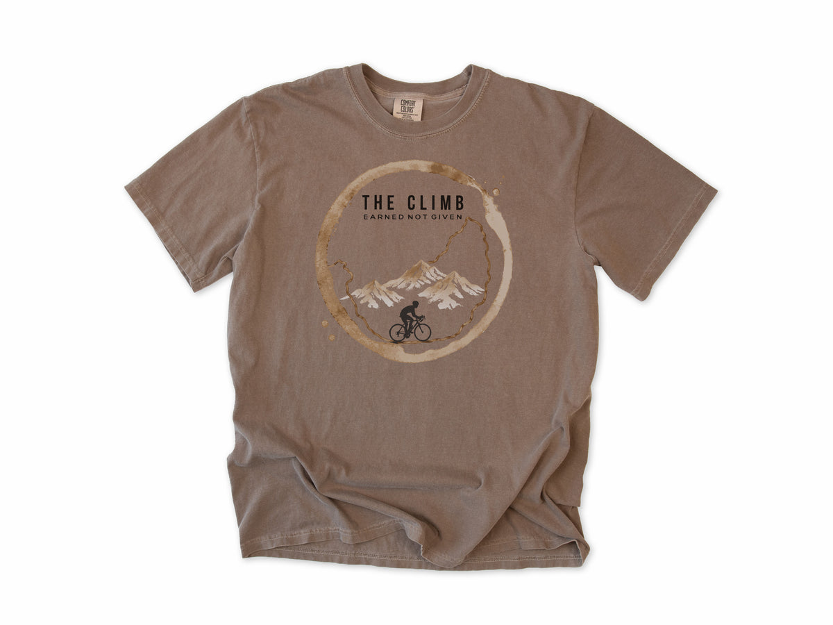 Funny cycling T-shirt in Espresso, 'The Climb', a coffee ring with a climbing cyclist, for coffee-loving climbers