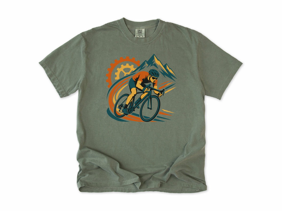 Cycling T-shirt in Moss, a cyclist before a chainring and mountains with orange swooshes, for road cyclists