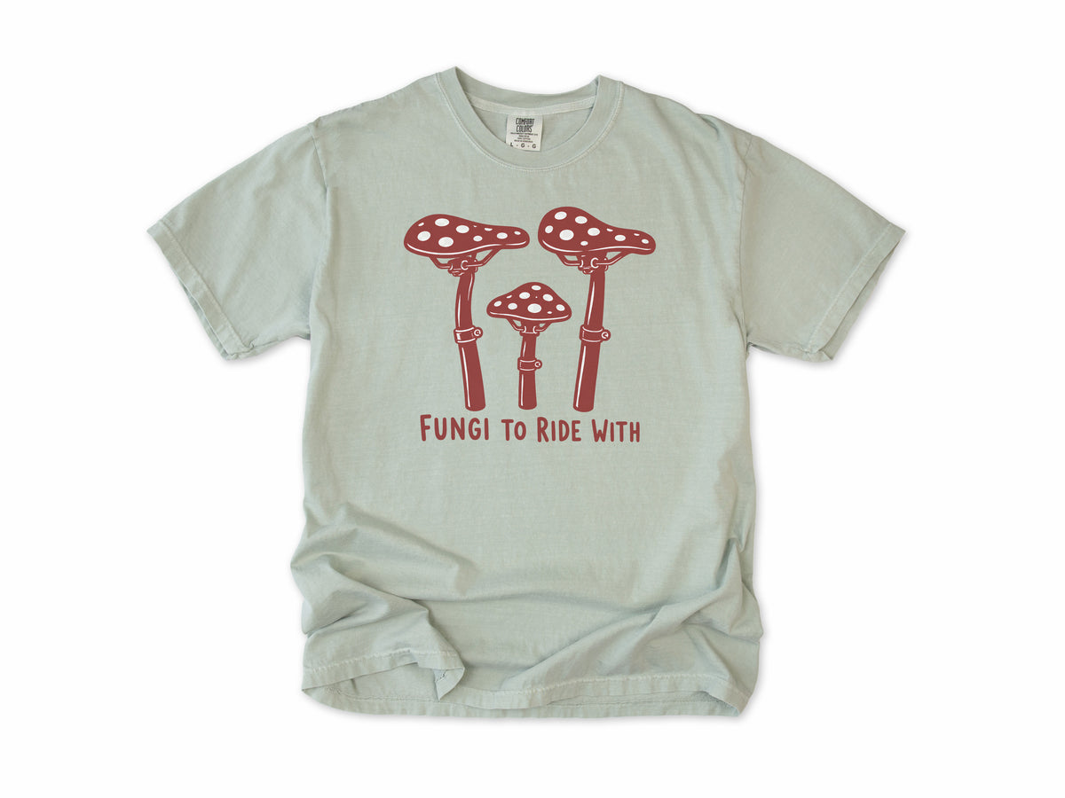 Funny cycling T-shirt in Bay, three red toadstools with handlebar stems, 'Fungi to Ride With', for mountain bikers