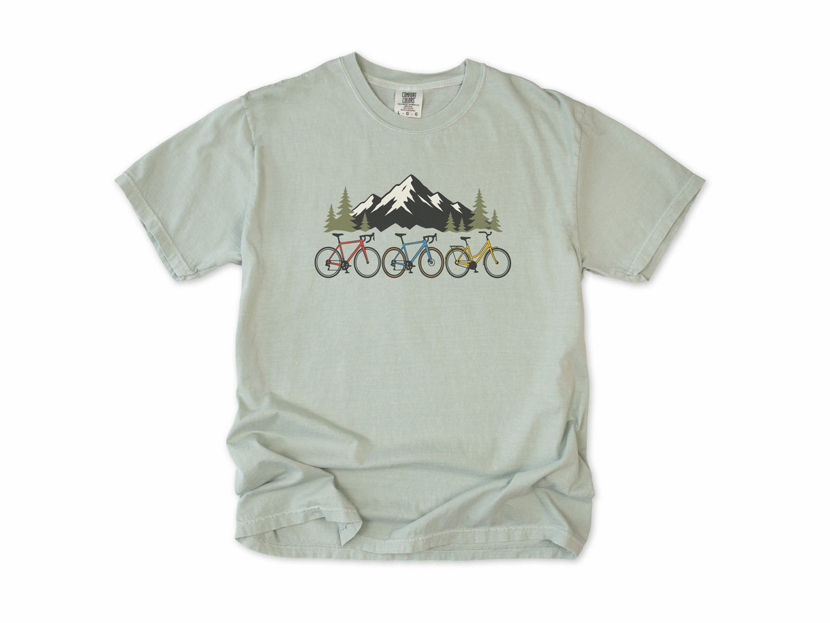 Cycling T-shirt in Bay, three bikes in front of a snowy mountain, for road and mountain bikers