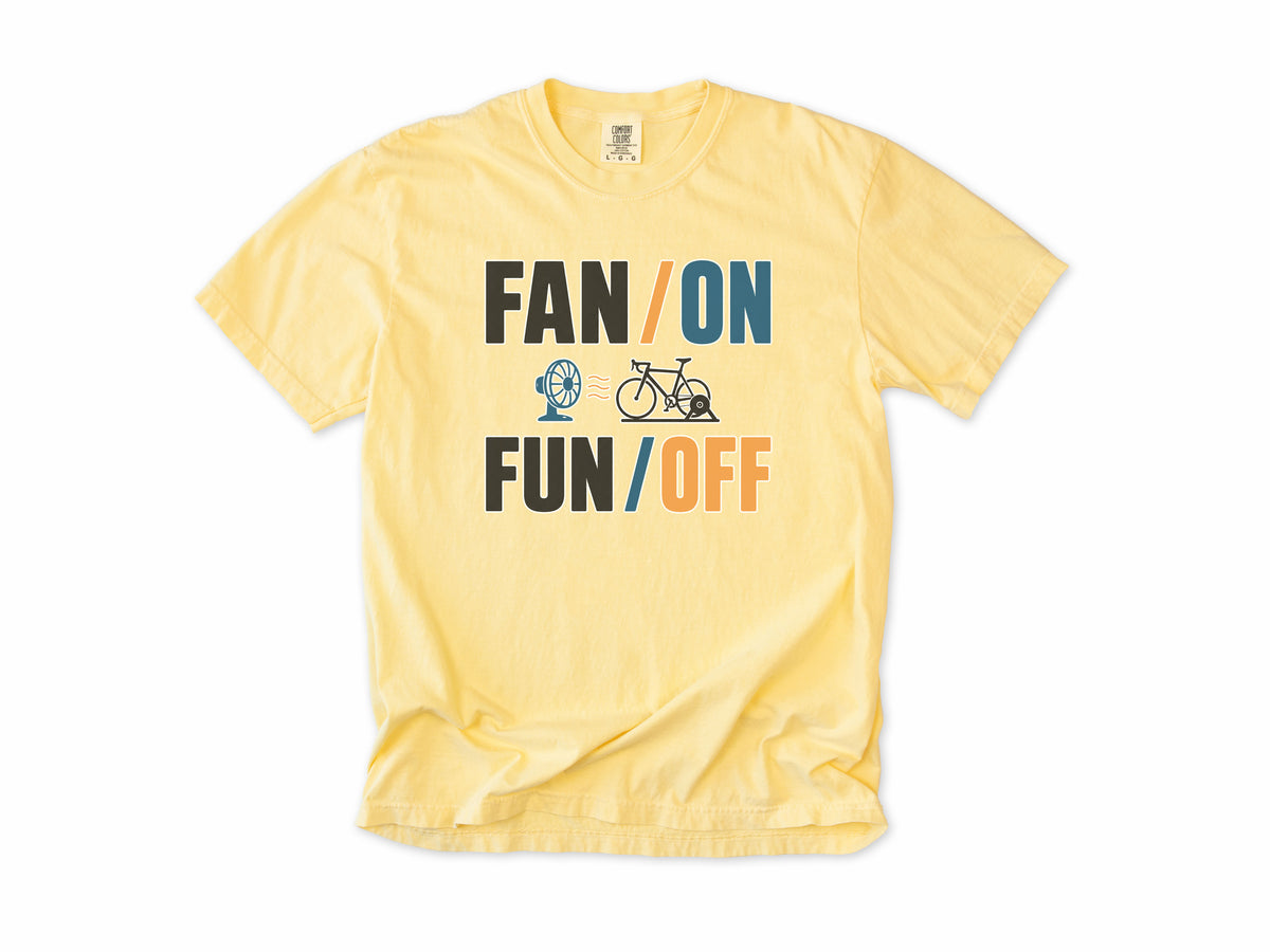 Funny cycling T-shirt in Butter, 'Fan On, Fun Off' with a bike on an indoor trainer and a fan, for indoor trainer riders