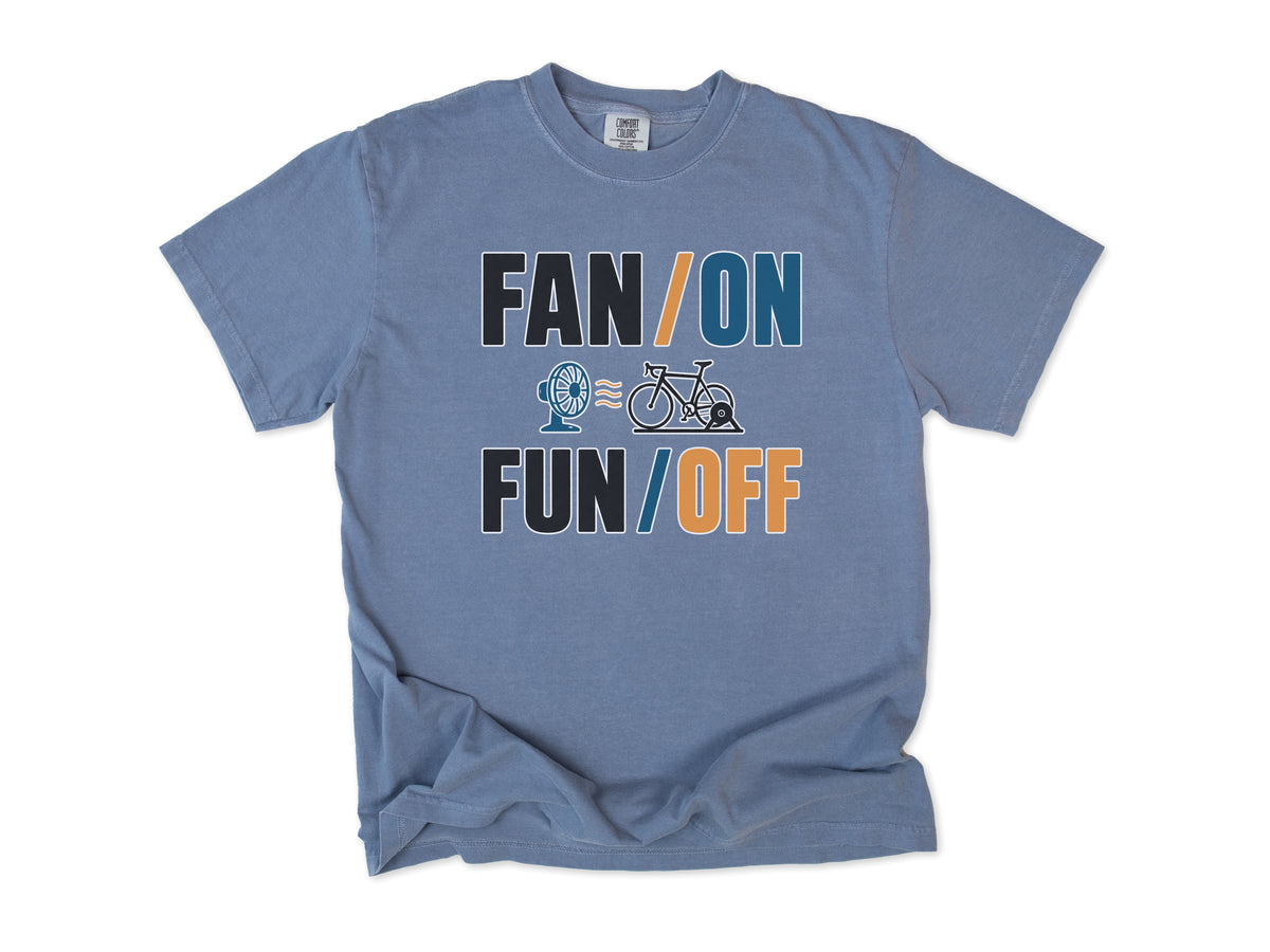 Funny cycling T-shirt in Blue Jean, 'Fan On, Fun Off' with a bike on an indoor trainer and a fan, for indoor trainer riders