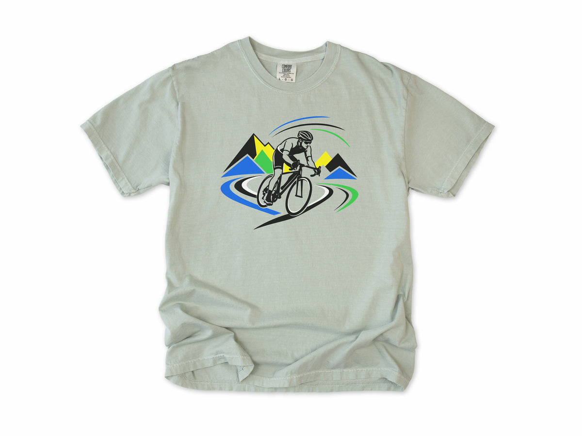 Cycling T-shirt in Ivory, a road racer on a winding road past bright mountains, for road racing fans