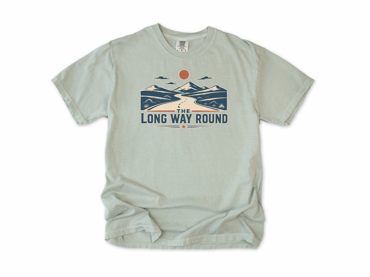 Cycling T-shirt in Bay, 'The Long Way Round' with a winding road through mountains, for touring and gravel cyclists