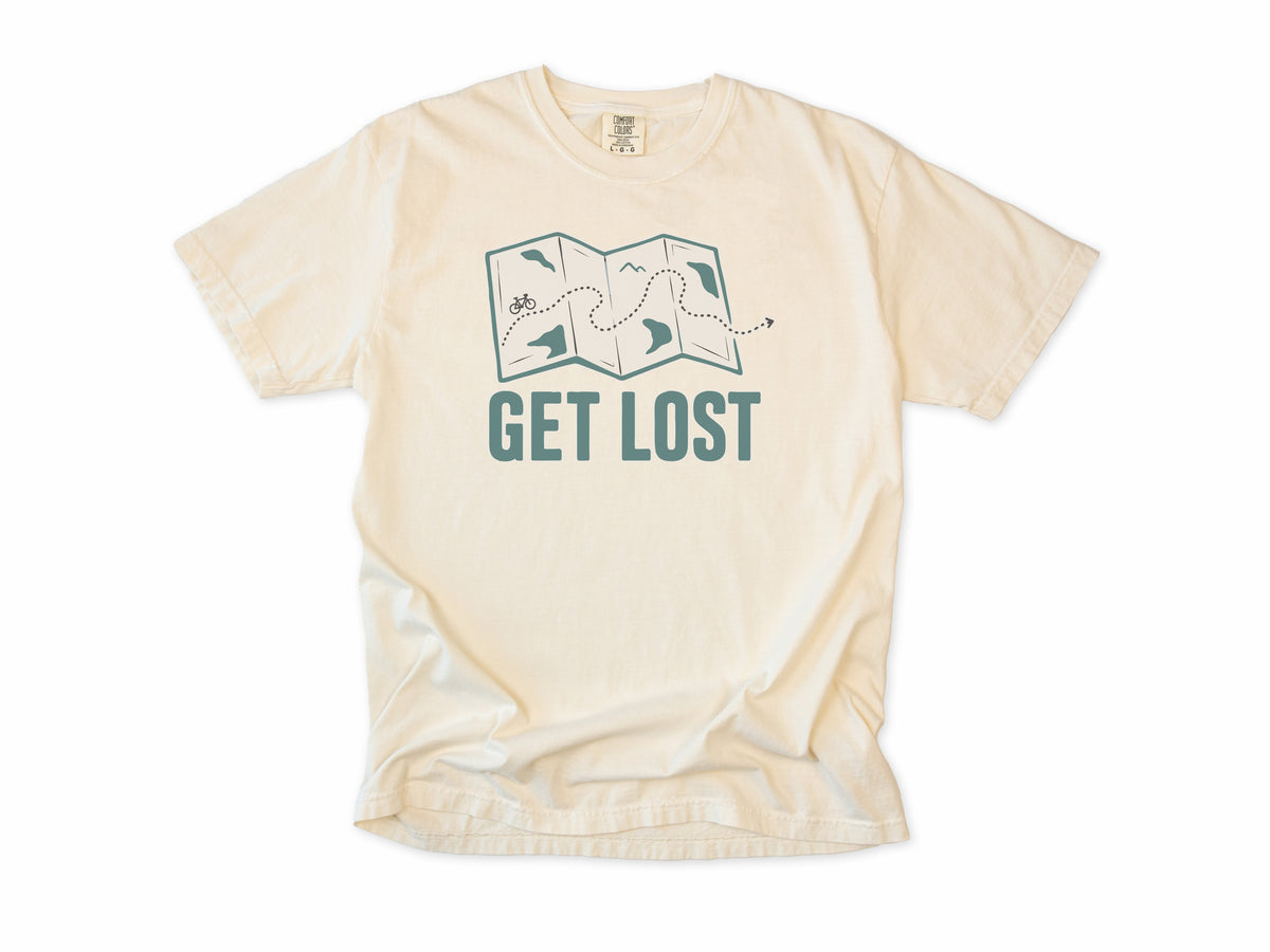 Cycling T-shirt in Ivory, a folded map with a dotted bike route, 'Get Lost', for gravel and touring riders