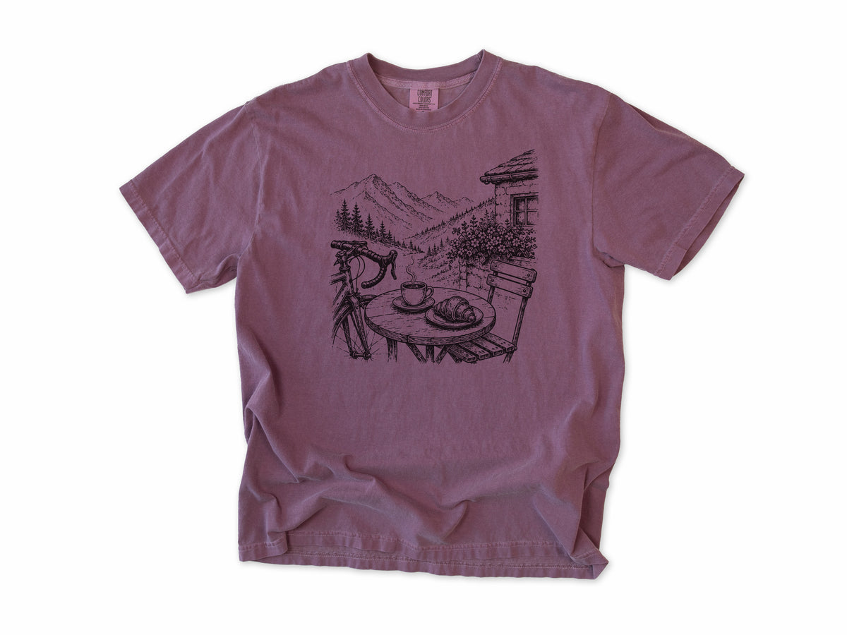 Cycling T-shirt in Berry, a sketch of a cafe table with coffee above an alpine valley, for cafe stop riders