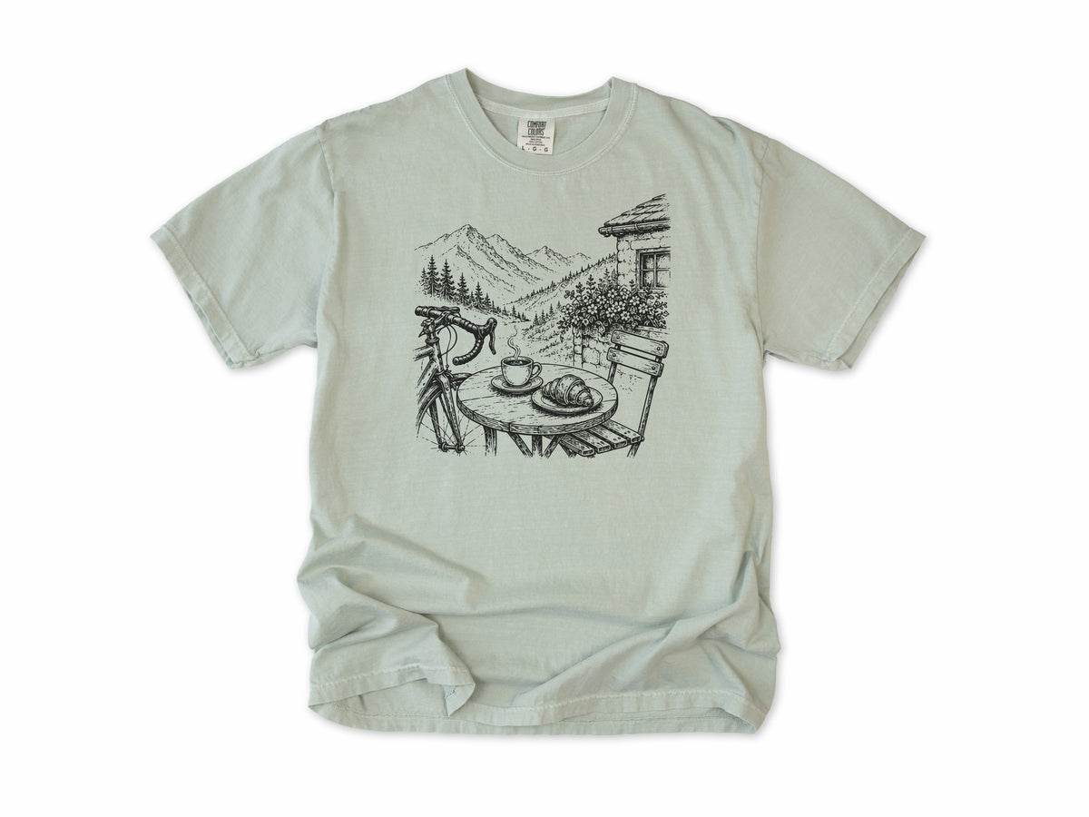 Cycling T-shirt in Bay, a sketch of a cafe table with coffee above an alpine valley, for cafe stop riders