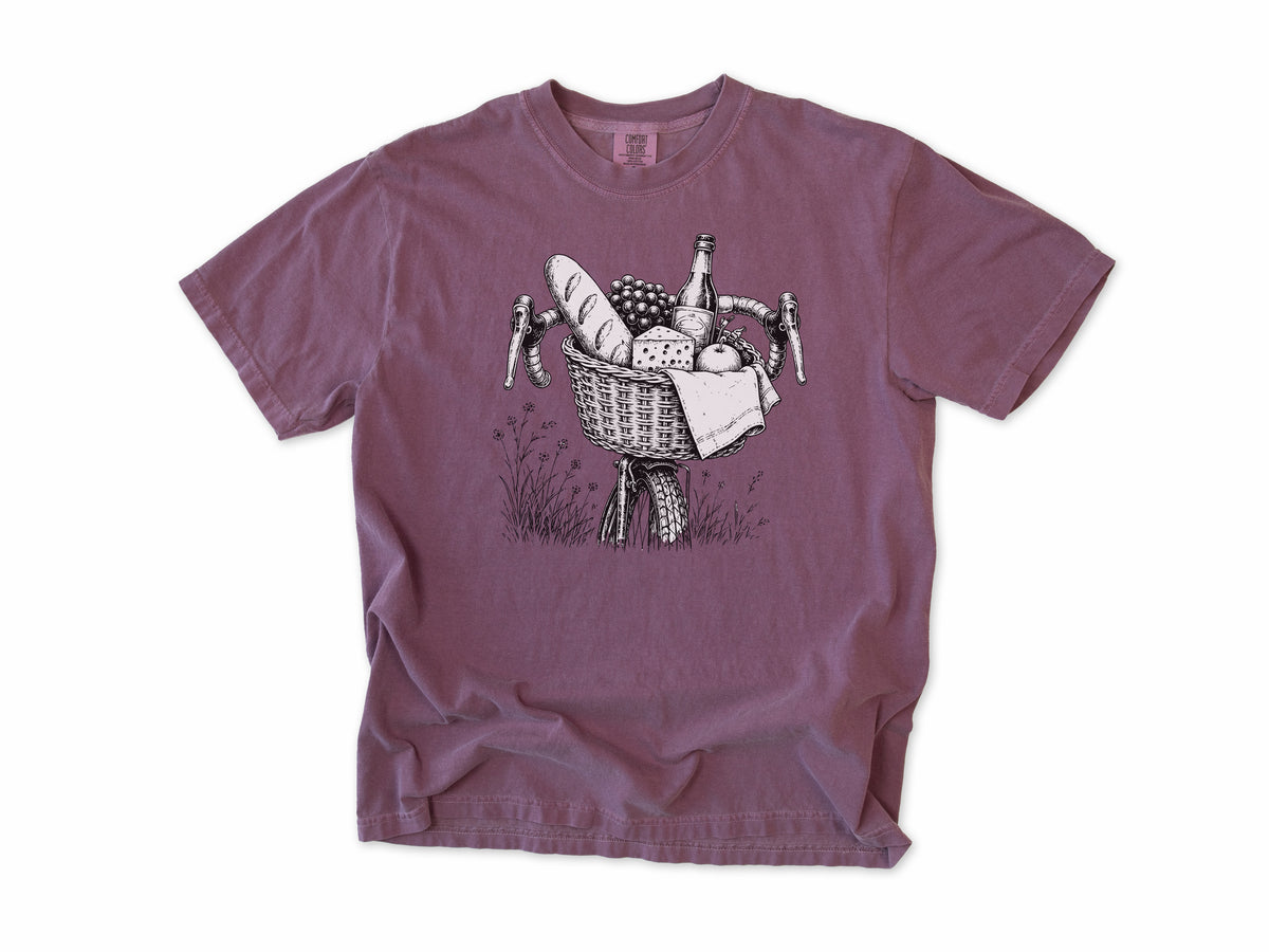 Cycling T-shirt in Berry, a bike basket with a baguette, cheese and wine, line drawing, for leisure and cafe cyclists