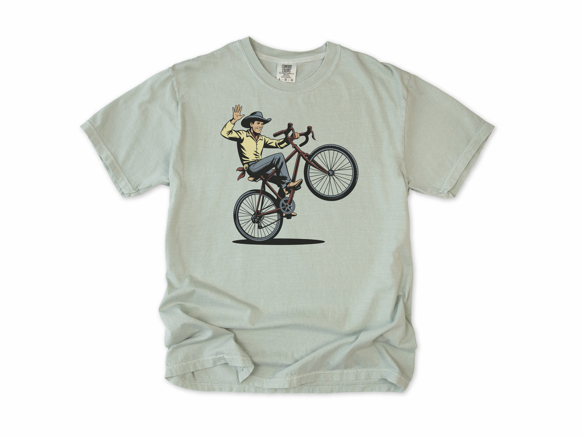 Cycling T-shirt in Bay, a cowboy doing a wheelie and waving his hat, for mountain bikers