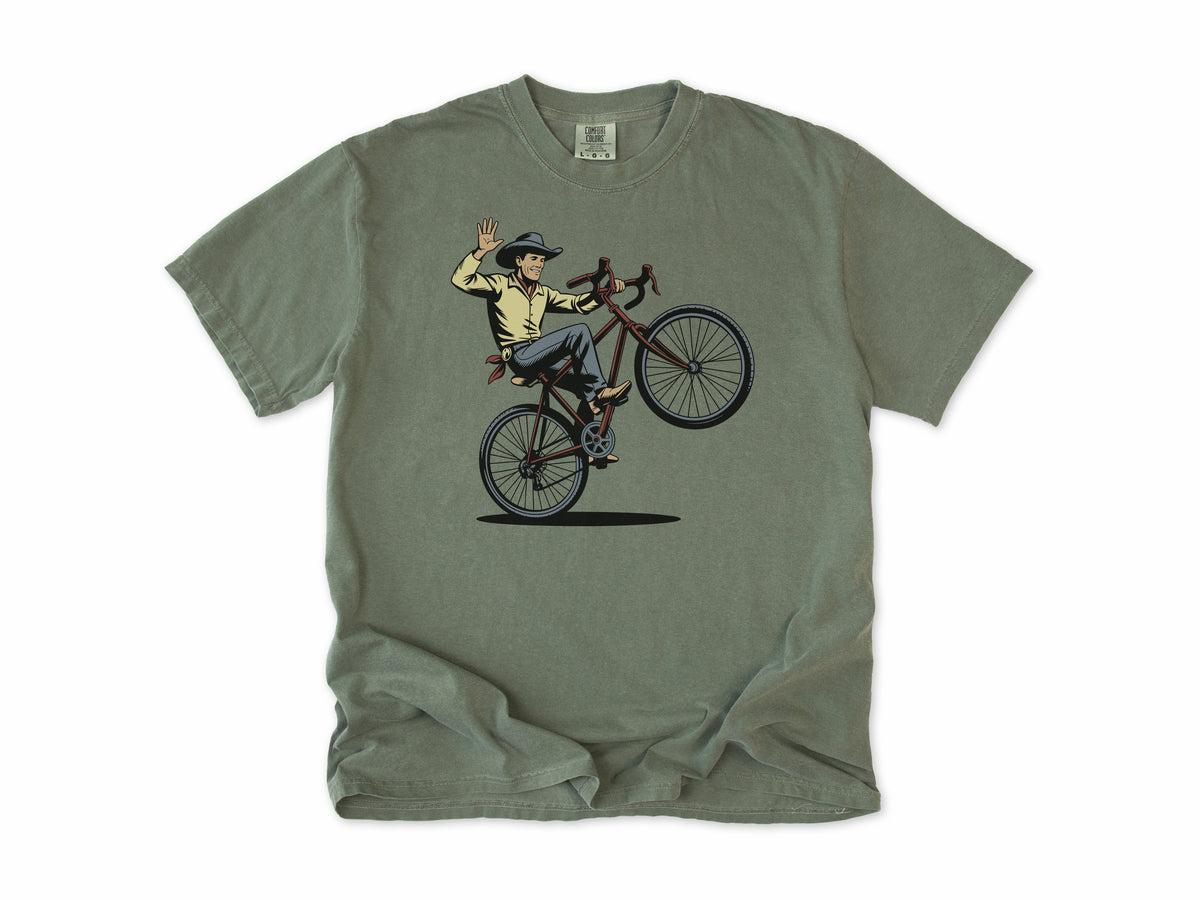 Cycling T-shirt in Moss, a cowboy doing a wheelie and waving his hat, for mountain bikers