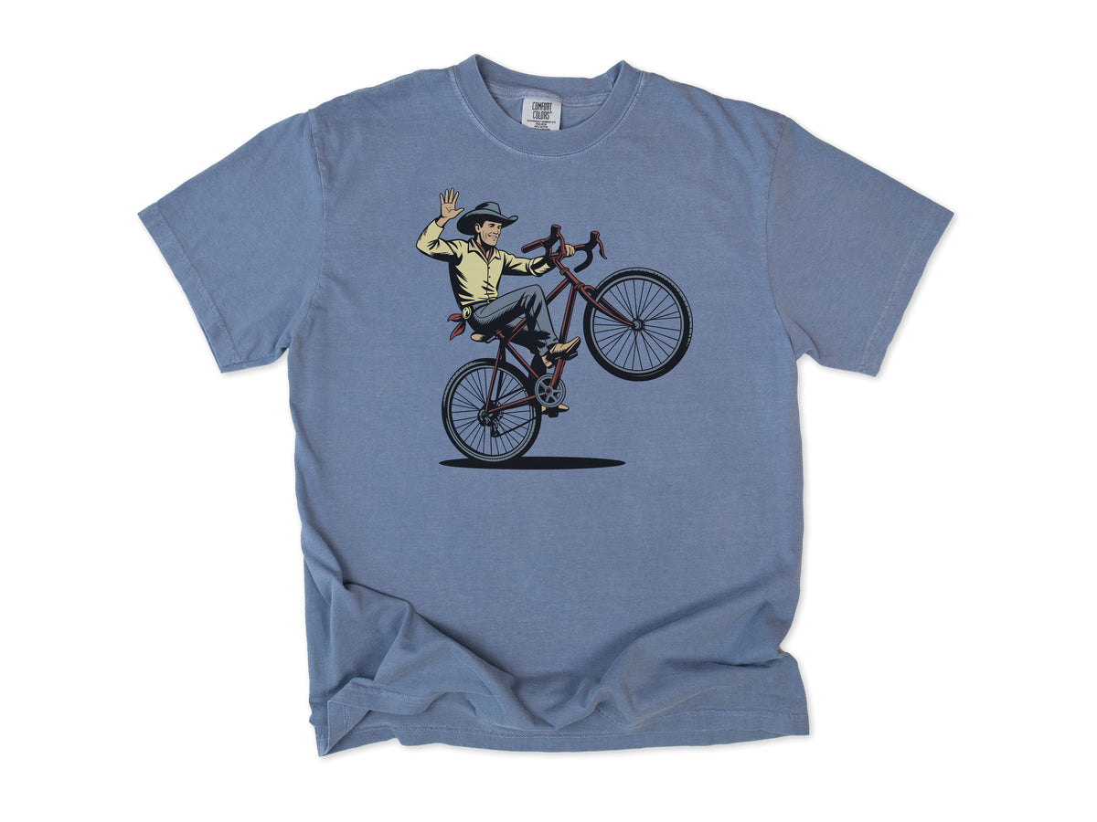 Cycling T-shirt in Blue Jean, a cowboy doing a wheelie and waving his hat, for mountain bikers