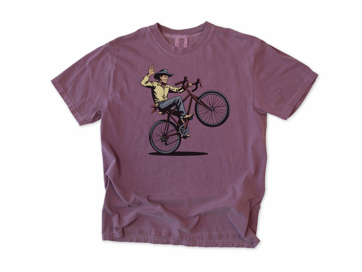 Cycling T-shirt in Berry, a cowboy doing a wheelie and waving his hat, for mountain bikers