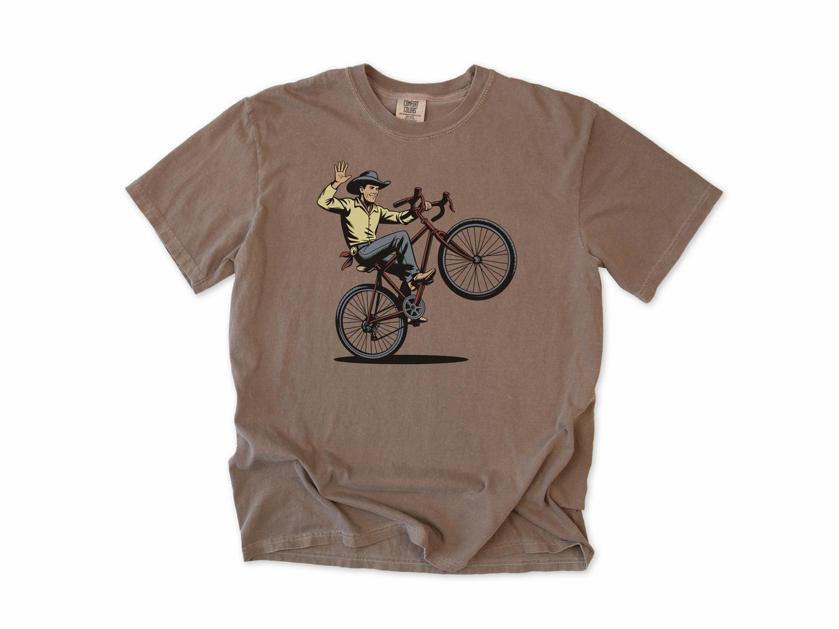 Cycling T-shirt in Espresso, a cowboy doing a wheelie and waving his hat, for mountain bikers