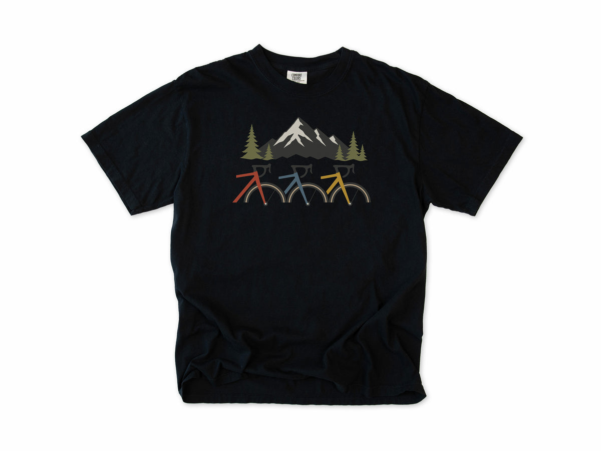 Cycling T-shirt in Black, three cropped bikes under a snowy mountain, for road and mountain bikers