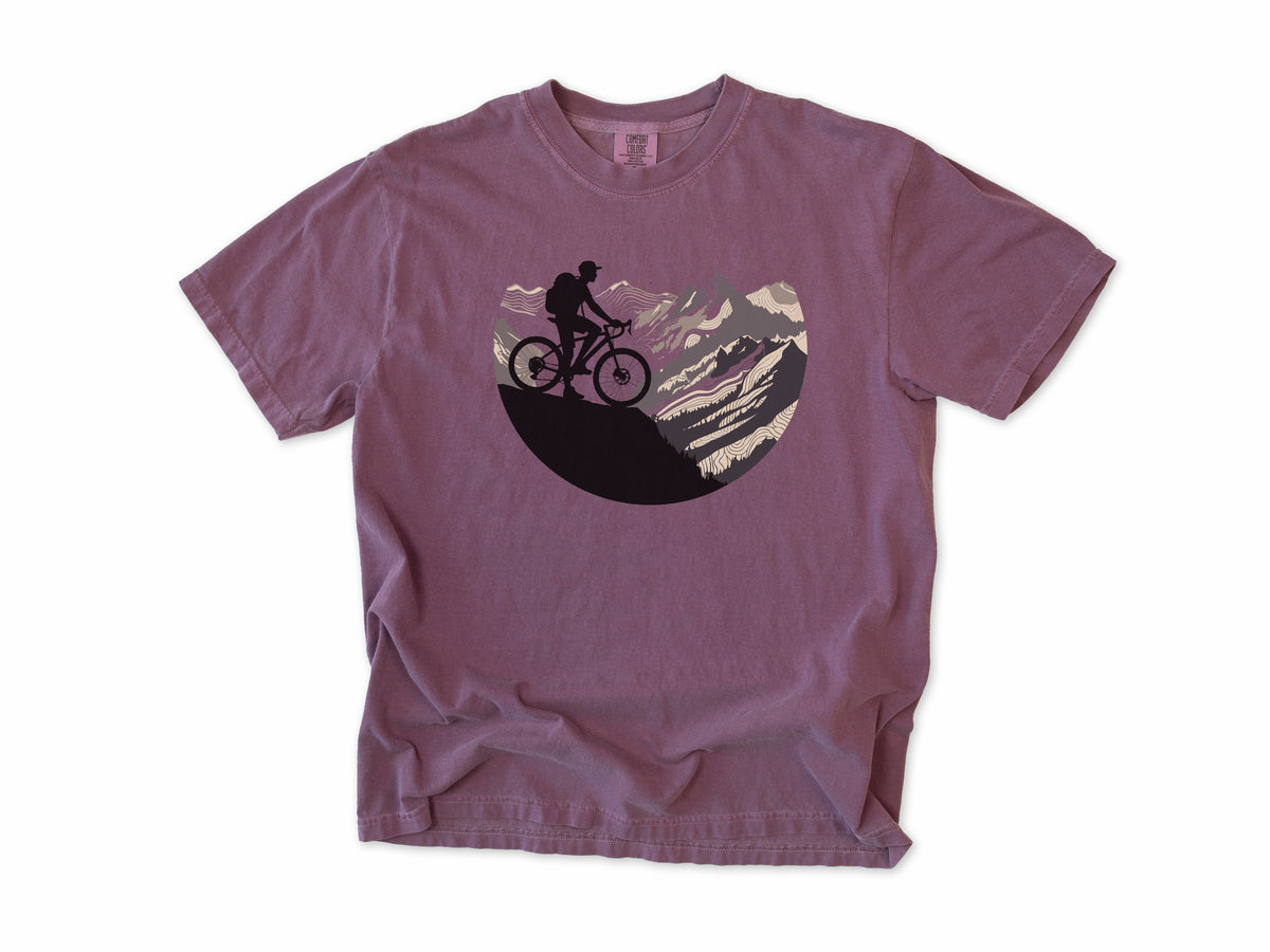 Cycling T-shirt in Berry, Cycling Mountain: a mountain biker riding up a rocky mountain, in a circle, for mountain bikers