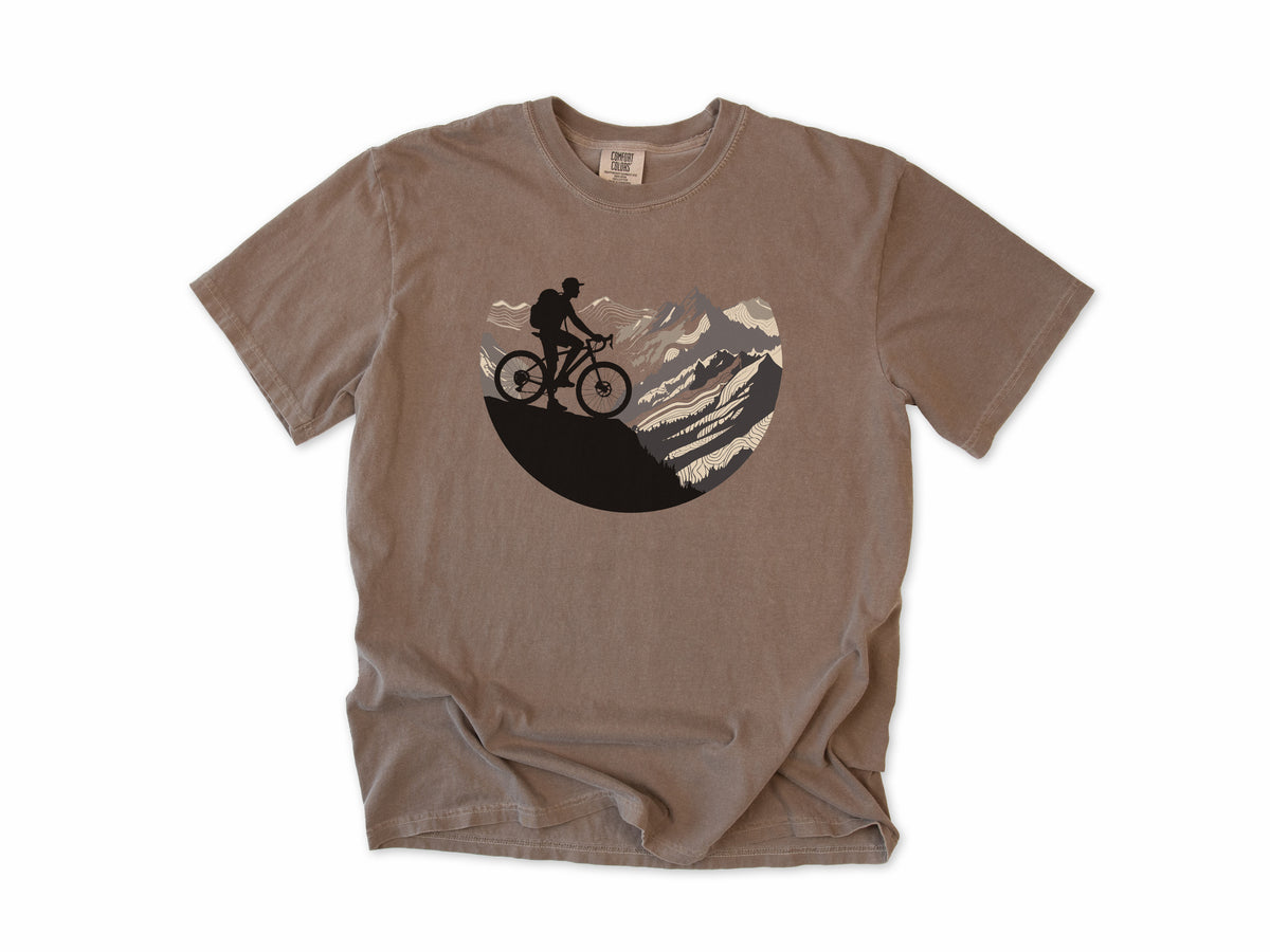 Cycling T-shirt in Espresso, Cycling Mountain: a mountain biker riding up a rocky mountain, in a circle, for mountain bikers