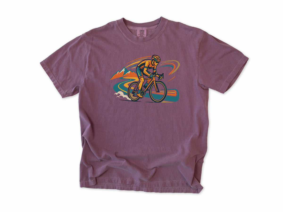 Cycling T-shirt in Berry, Cycling: a road cyclist racing past mountains in orange, teal and blue swirls, for road cyclists