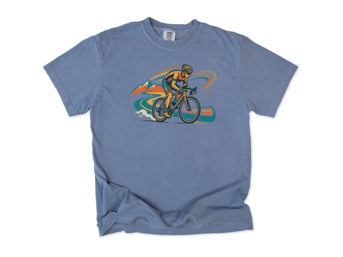 Cycling T-shirt in Blue Jean, Cycling: a road cyclist racing past mountains in orange, teal and blue swirls, for road cyclists