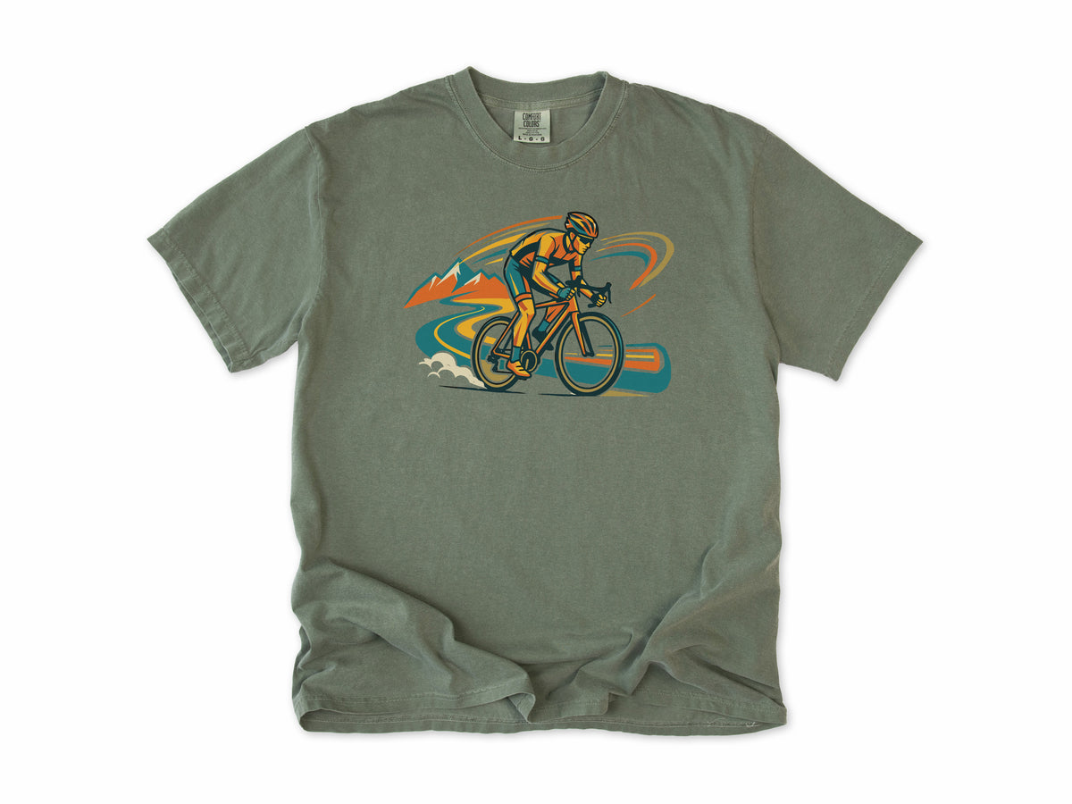 Cycling T-shirt in Moss, Cycling: a road cyclist racing past mountains in orange, teal and blue swirls, for road cyclists
