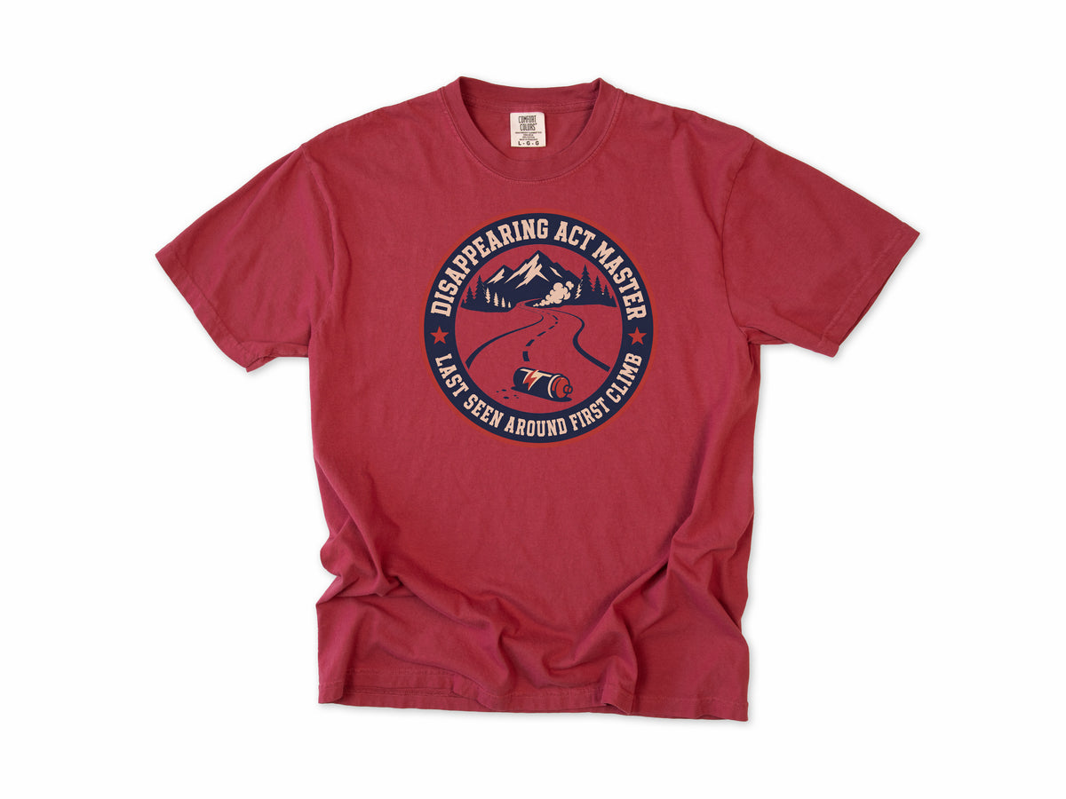 Funny cycling T-shirt in Chili, 'Disappearing Act Master', a mountain road and bottle, for riders who get dropped