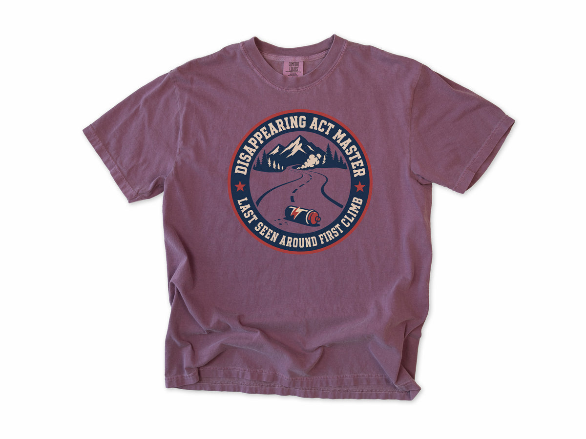 Funny cycling T-shirt in Berry, 'Disappearing Act Master', a mountain road and bottle, for riders who get dropped