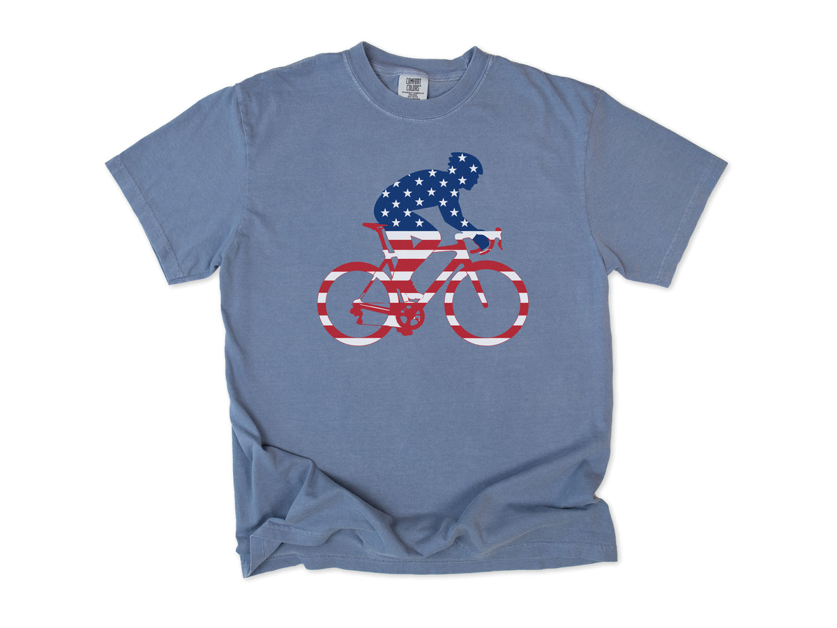 Cycling T-shirt in Blue Jean, a rider and bike filled with US flag stars and stripes, 4th of July gift for cyclists