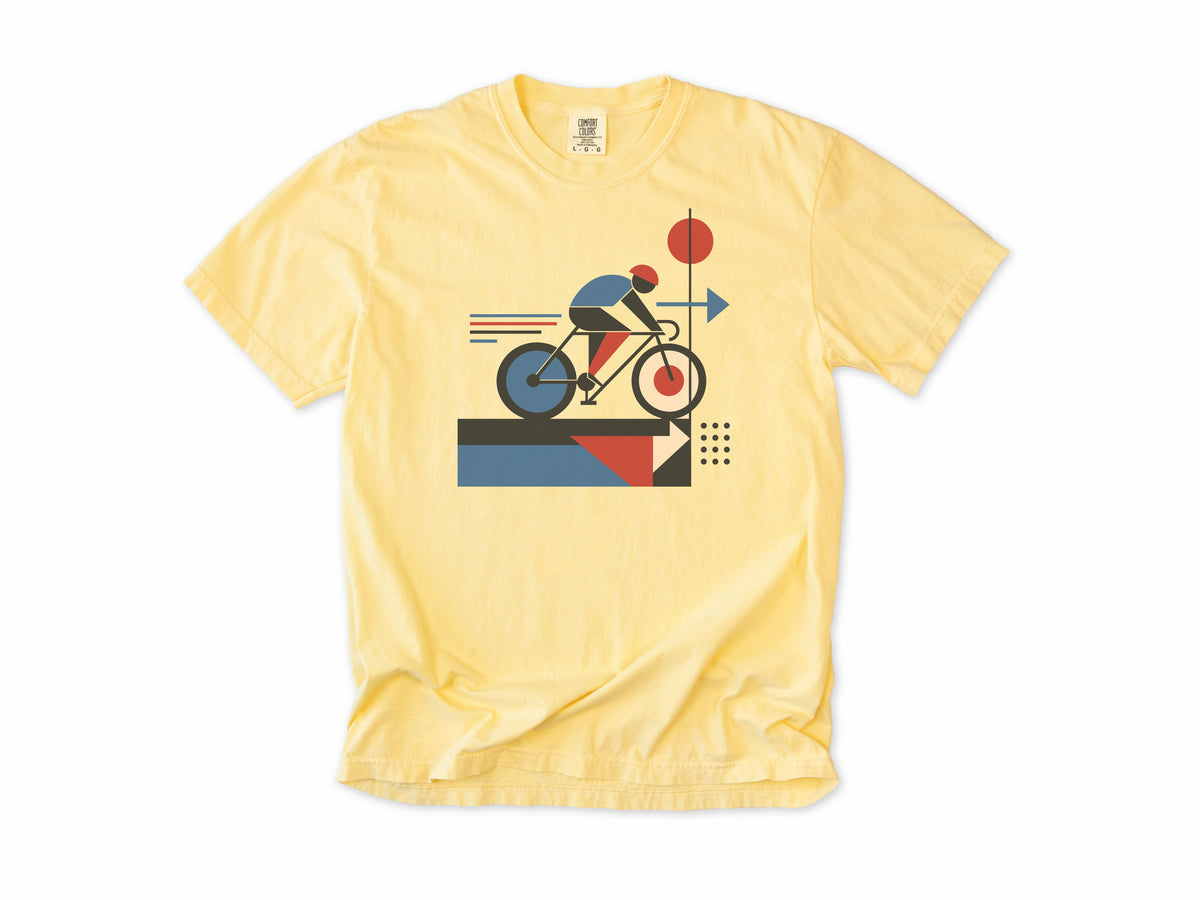 Cycling T-shirt in Butter, a geometric artwork of a cyclist with red and blue shapes, for road cyclists