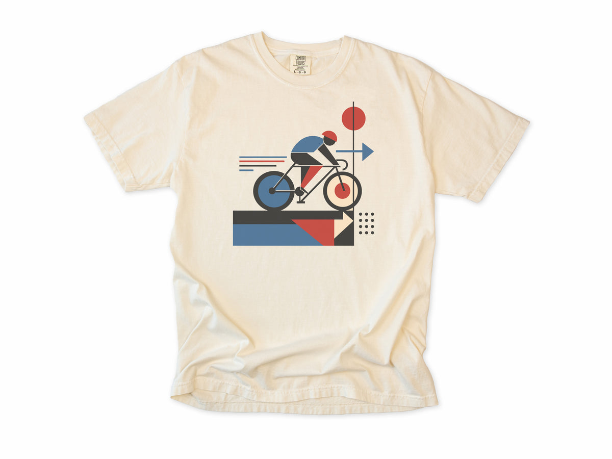Cycling T-shirt in Ivory, a geometric artwork of a cyclist with red and blue shapes, for road cyclists