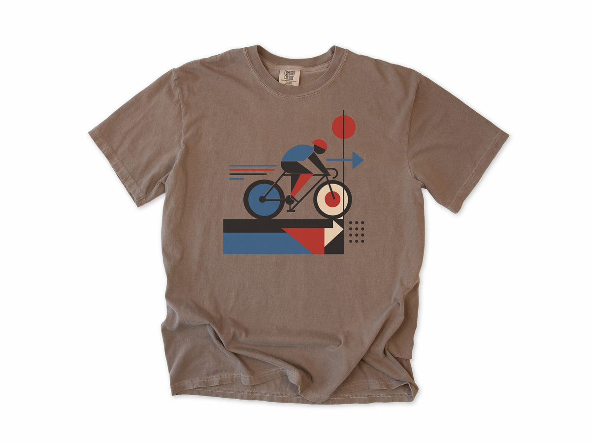 Cycling T-shirt in Espresso, a geometric artwork of a cyclist with red and blue shapes, for road cyclists