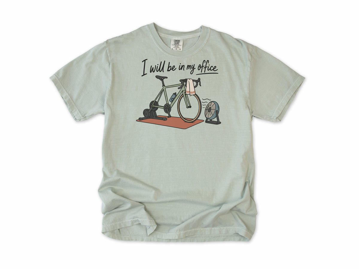 Funny cycling T-shirt in Bay, 'I will be in my office' with a bike on a trainer and a fan, for indoor trainer riders
