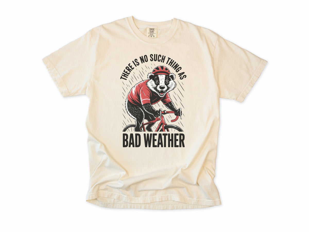 Funny cycling T-shirt in Ivory, a badger cycling, 'There is no such thing as bad weather', for all-weather riders