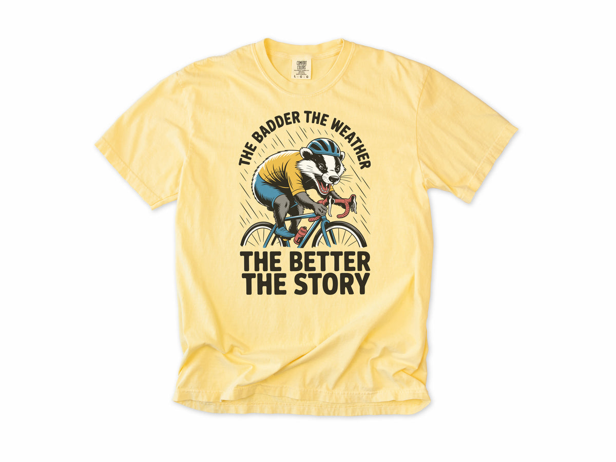 Funny cycling T-shirt in Butter, a badger cycling, 'The badder the weather the better the story', for all-weather riders