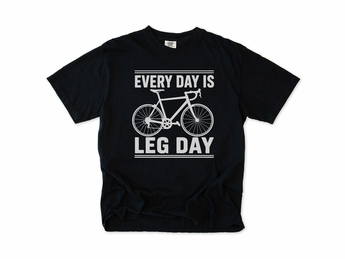 Cycling T-shirt in Black, 'Every Day Is Leg Day' with a road bike, for cyclists