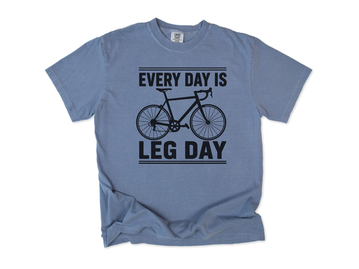 Cycling T-shirt in Blue Jean, 'Every Day Is Leg Day' with a road bike, for cyclists