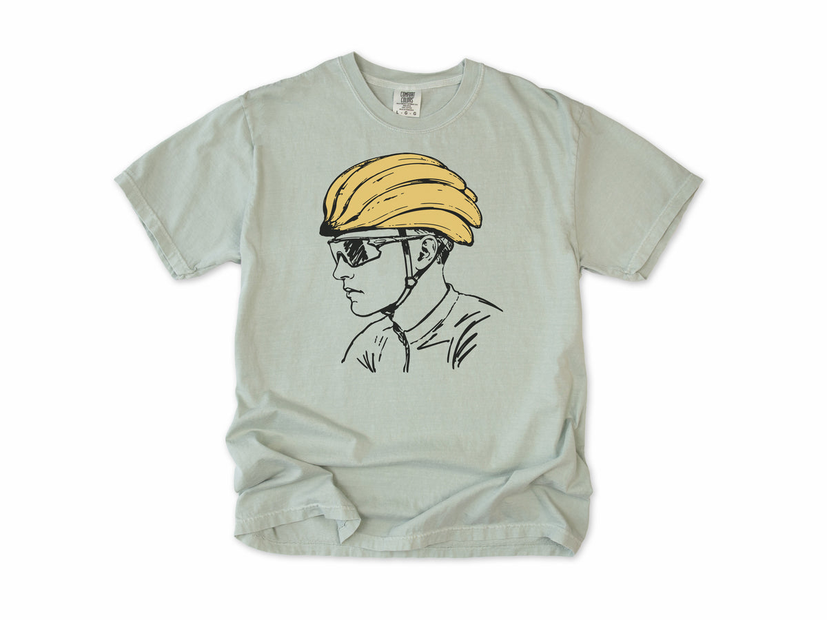 Funny cycling T-shirt in Bay, a line drawing of a cyclist in sunglasses and a banana helmet, for road cyclists