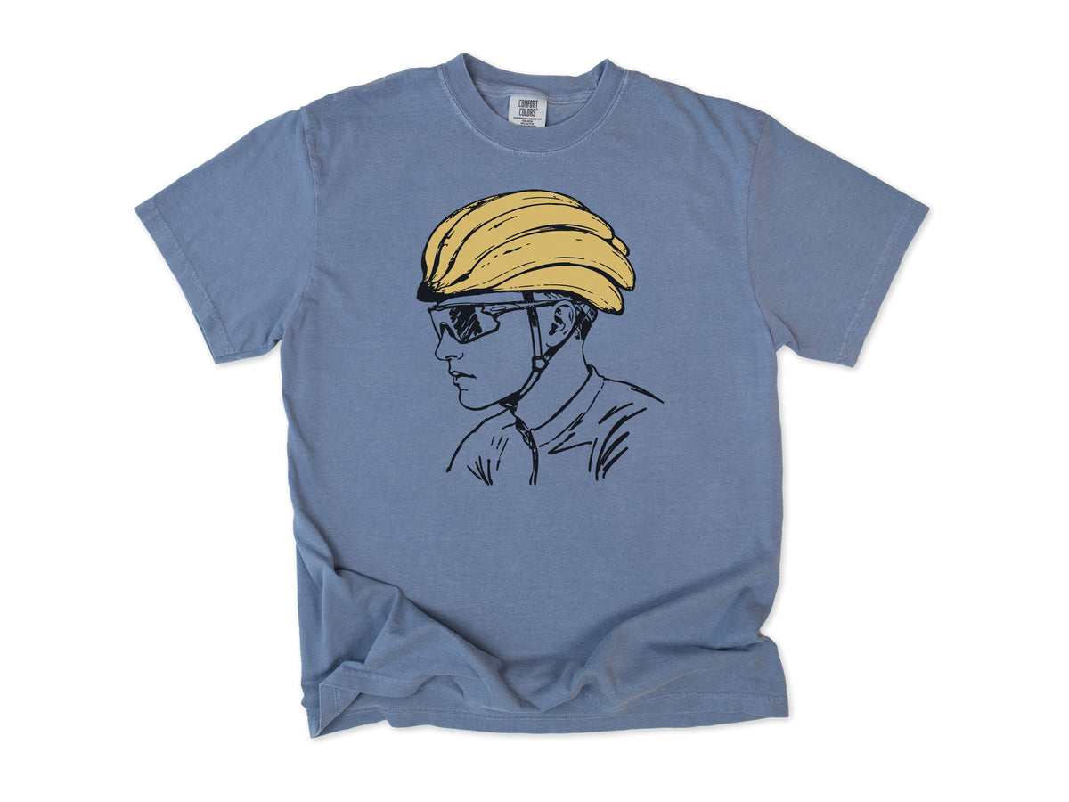Funny cycling T-shirt in Blue Jean, a line drawing of a cyclist in sunglasses and a banana helmet, for road cyclists
