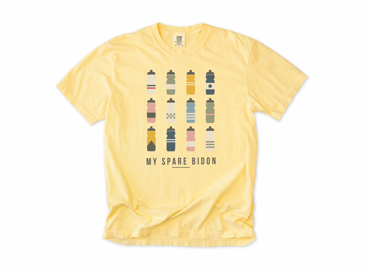 Funny cycling T-shirt in Butter, 'My Spare Bidon' with twelve colourful water bottles, for cyclists who collect bottles